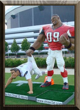 Atlanta Falcons’ football player replica gives wedgie to opponent team character